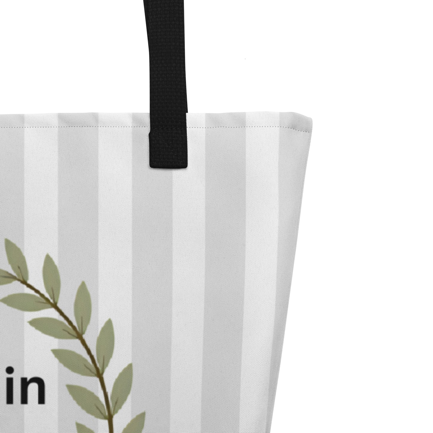 Close-up of the front design showing the olive-green laurel wreath, small cross, and the text “resting in HIS promises” with “Matt 11:28–30” beneath it on the pale striped background.
