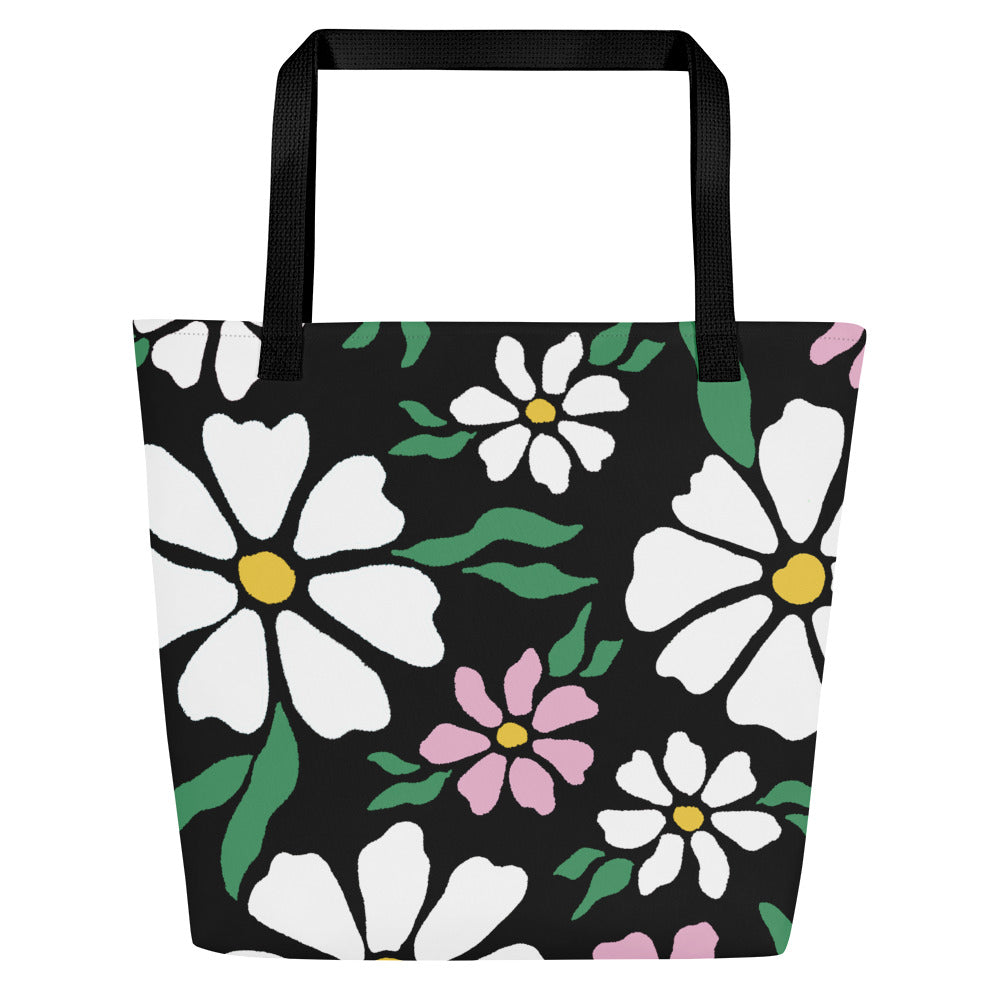 Back view of black tote bag with black straps and allover floral pattern, without the heart text graphic.