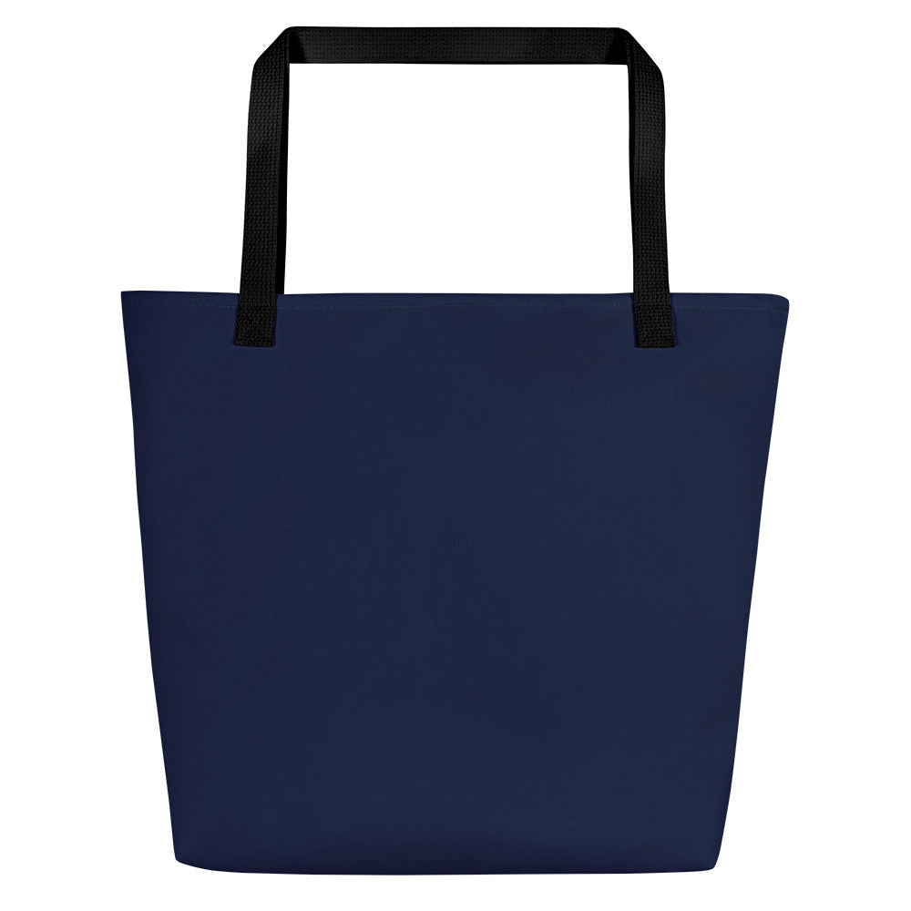 Back view of navy tote bag with black straps and a solid design with no front graphic.