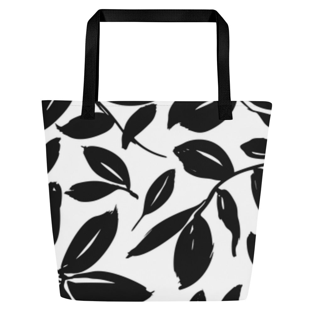 Back view of white tote bag with black straps and allover black leaf pattern, without the pink heart graphic.