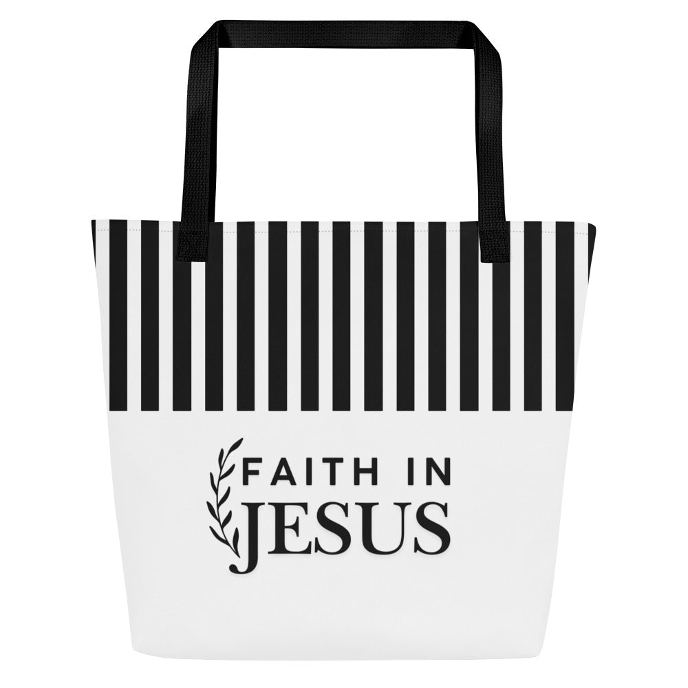 Front view of white tote bag with black straps, bold black vertical stripes across the top, and “FAITH IN JESUS” text with a small leafy branch graphic.
