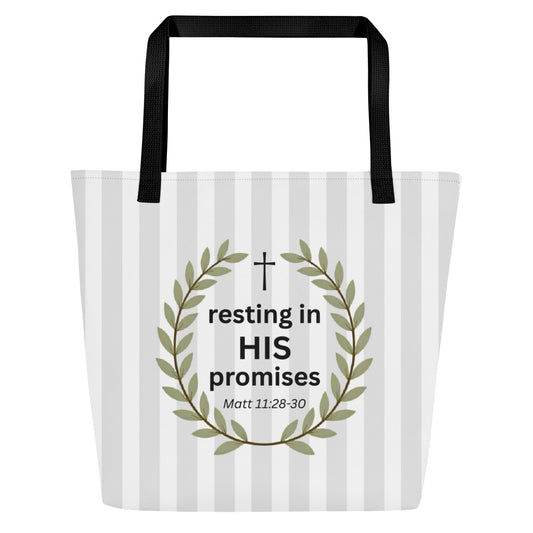 Front view of a large tote bag with black webbing straps and a light gray-and-white vertical stripe pattern. Centered text reads “resting in HIS promises” with “Matt 11:28–30” below, framed by an olive-green laurel wreath and a small cross above the words.