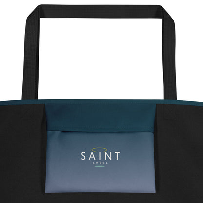 Inside pocket view showing a dark teal interior pocket with “Saint Label” branding.