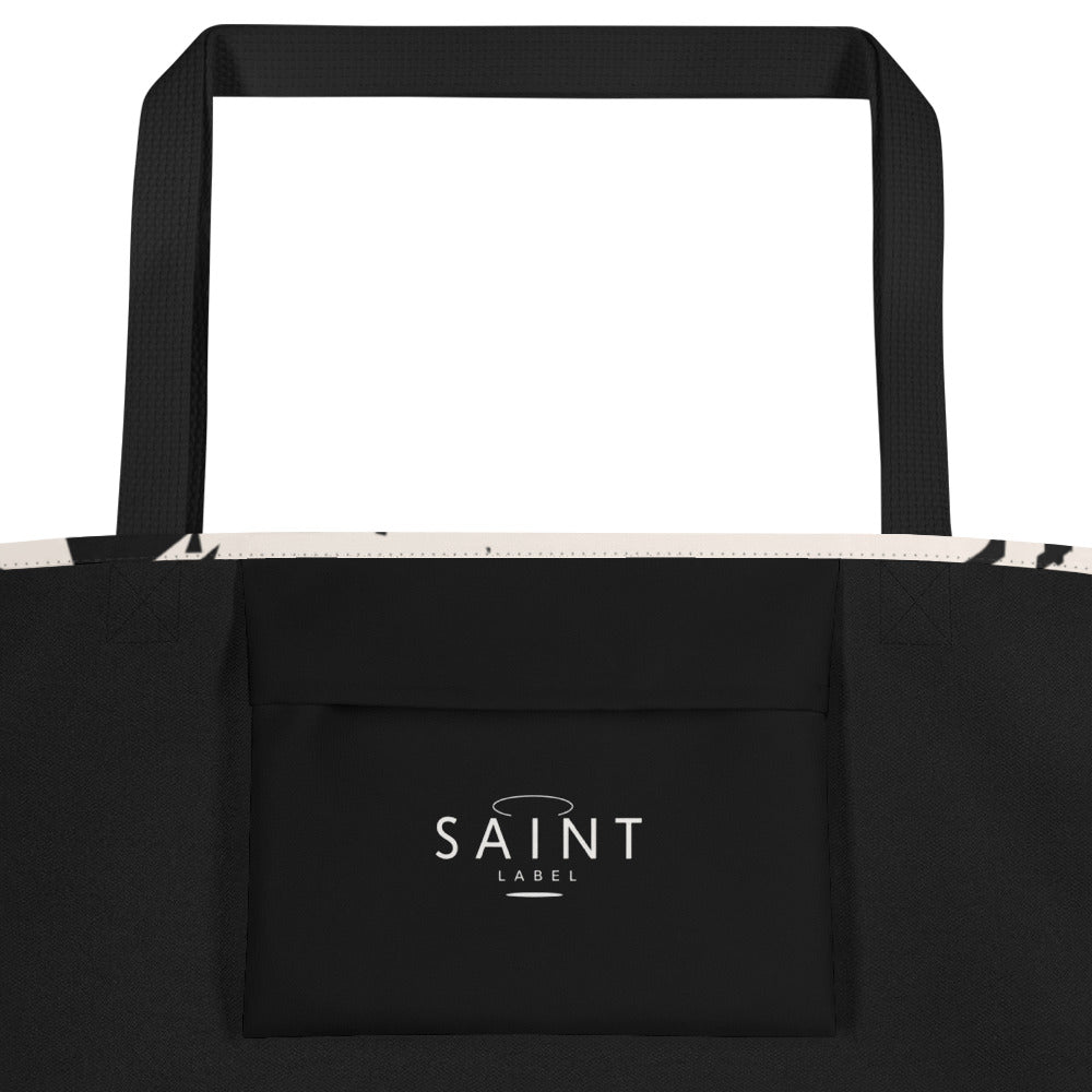 Inside pocket view showing a black interior pocket with “Saint Label” branding.