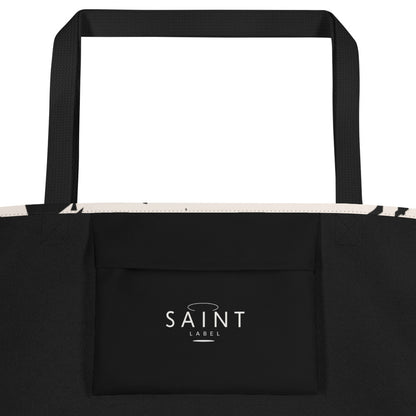Inside pocket view showing a black interior pocket with “Saint Label” branding.