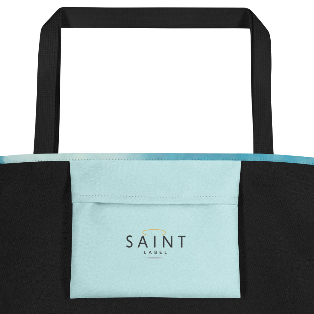 Inside pocket view showing a light blue interior pocket with “Saint Label” branding.