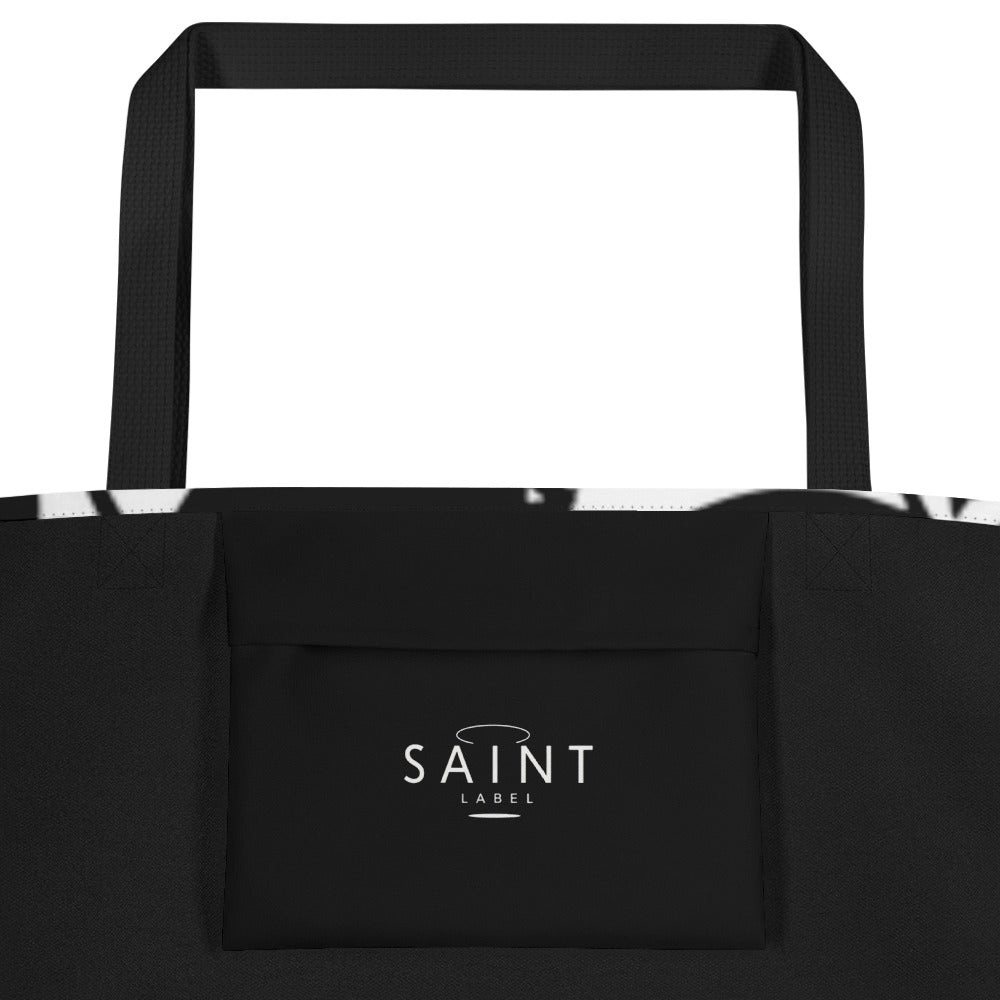 Inside pocket view showing a black interior pocket with “Saint Label” branding.