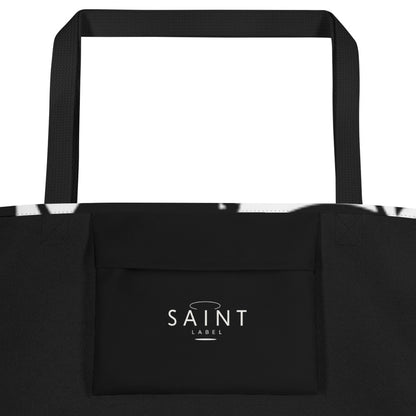 Inside pocket view showing a black interior pocket with “Saint Label” branding.