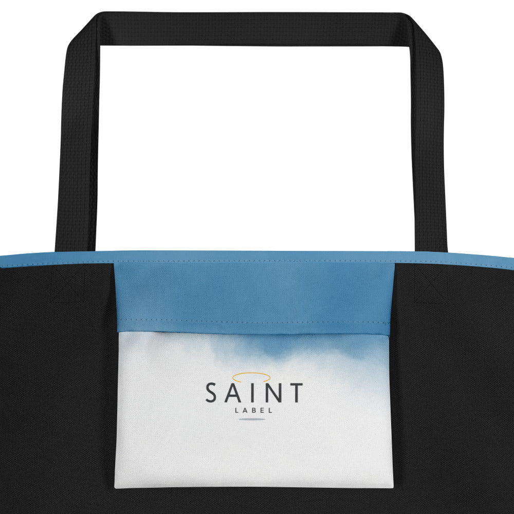 Inside pocket view showing a white interior pocket with “Saint Label” branding and a blue top panel.