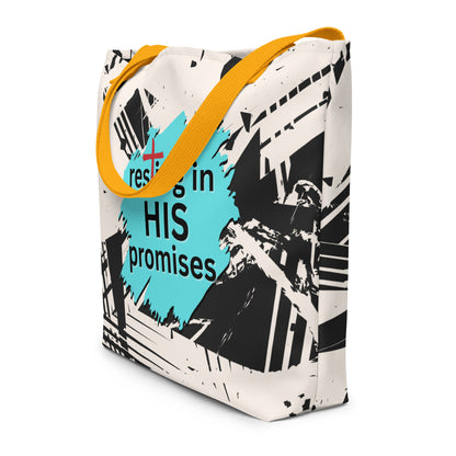 Angled view of white tote bag with yellow straps, abstract black pattern, and teal “resting in HIS promises” graphic.
