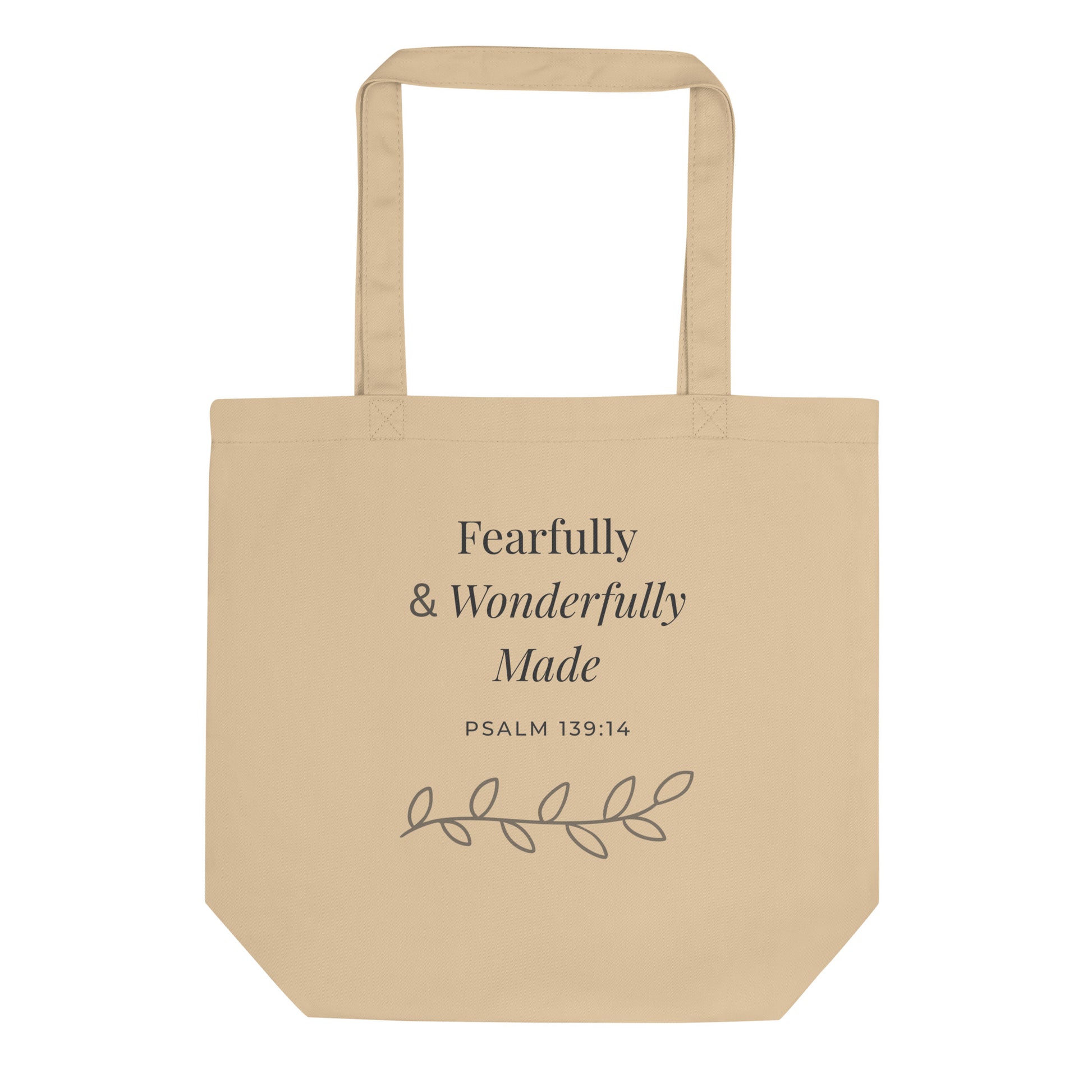 Front view of a natural cotton Christian tote bag with matching beige handles and “Fearfully & Wonderfully Made Psalm 139:14” text.