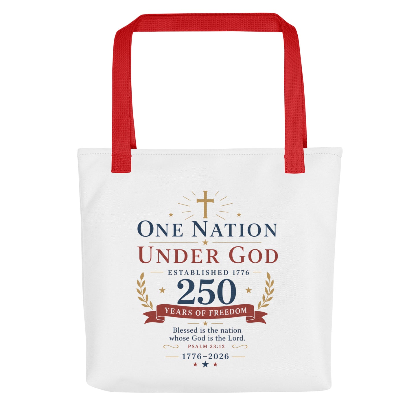 Front view of a white Christian patriotic tote bag with red handles and a “One Nation Under God 250 Years of Freedom” design.