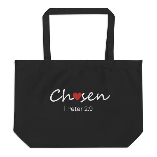Front view of a black tote bag featuring the word “Chosen” with a red heart and “1 Peter 2:9” in white text.