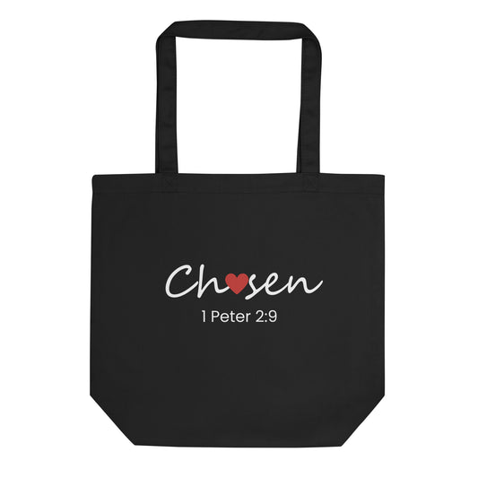 Black cotton tote bag with “Chosen” in white script with a red heart accent and “1 Peter 2:9” printed underneath.