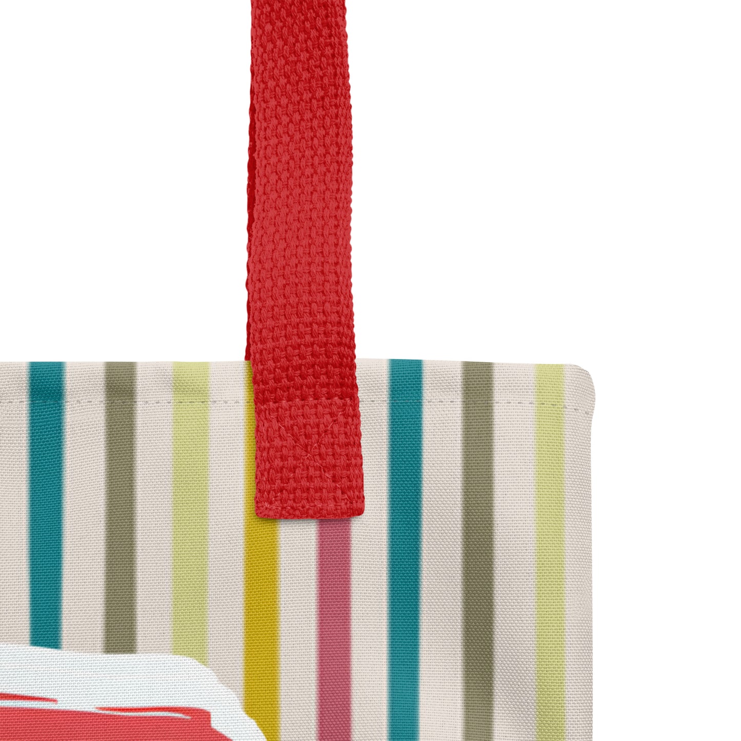 Close-up of the multicolor striped tote fabric and red strap, highlighting the stitching, textured canvas, and vertical stripe pattern.