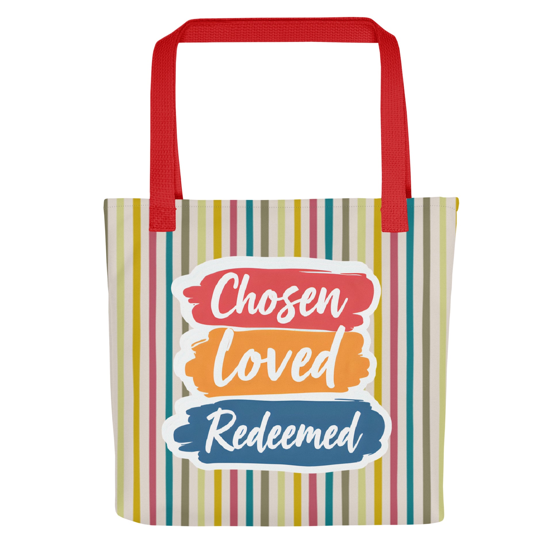 Front view of a striped tote bag with red handles featuring “Chosen Loved Redeemed” in white script on red, orange, and blue brushstroke blocks.