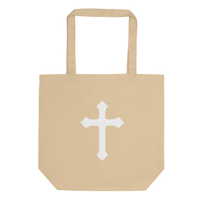 Natural cotton tote bag with a large white cross graphic centered on the front.