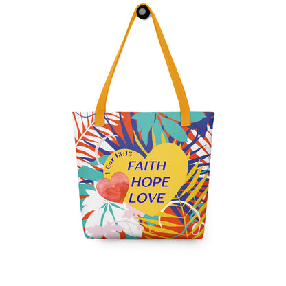 Colorful floral tote bag hanging on a hook with mustard-yellow handles featuring “Faith Hope Love” and “1 Corinthians 13:13” on a yellow heart.