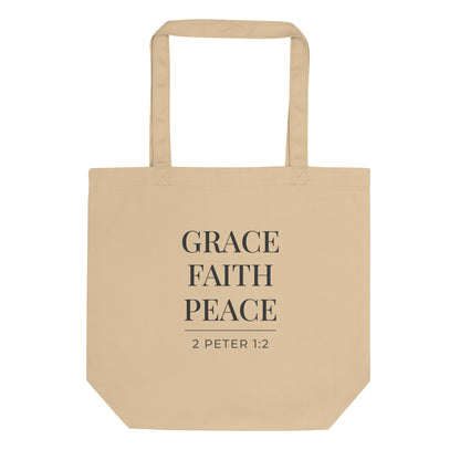 Natural cotton tote bag with black text reading “GRACE FAITH PEACE”