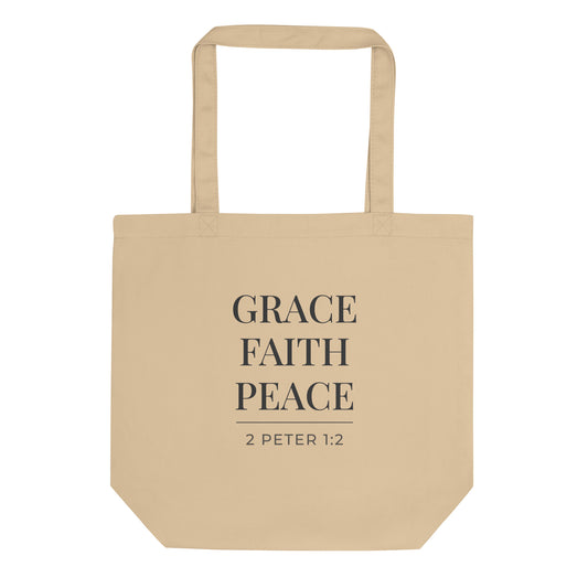Natural cotton tote bag with black text reading “GRACE FAITH PEACE”