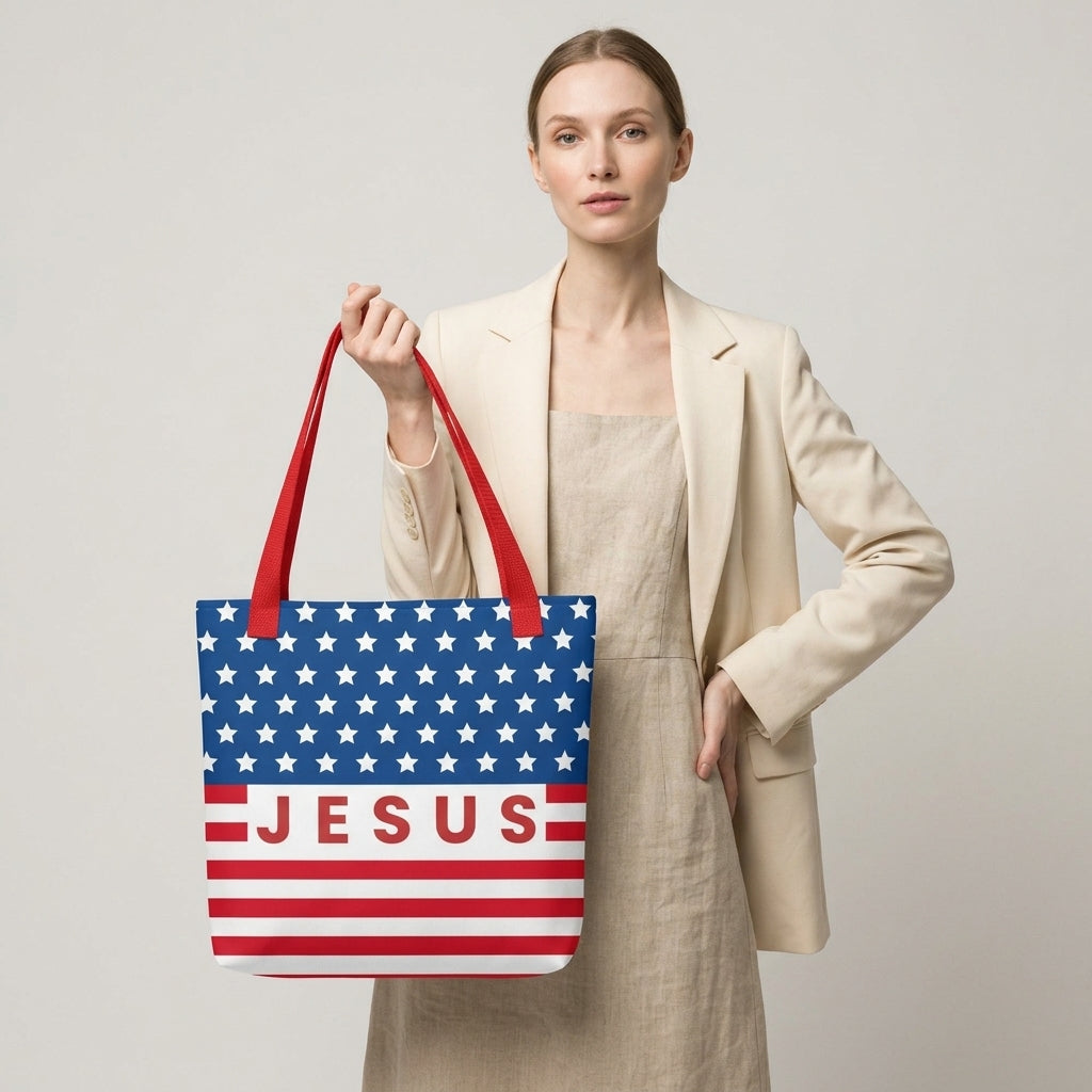 Model carrying a patriotic Christian tote bag with red handles, an American flag-inspired design, and “Jesus” text across the front.