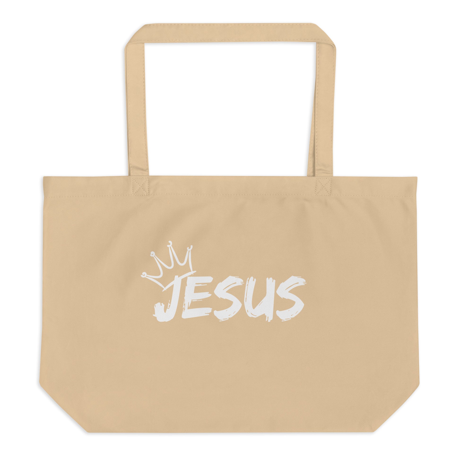 Large natural cotton tote bag with a white brush-style “JESUS” graphic and a small crown above the lettering.