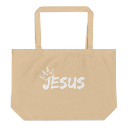 Large natural cotton tote bag with a white brush-style “JESUS” graphic and a small crown above the lettering.