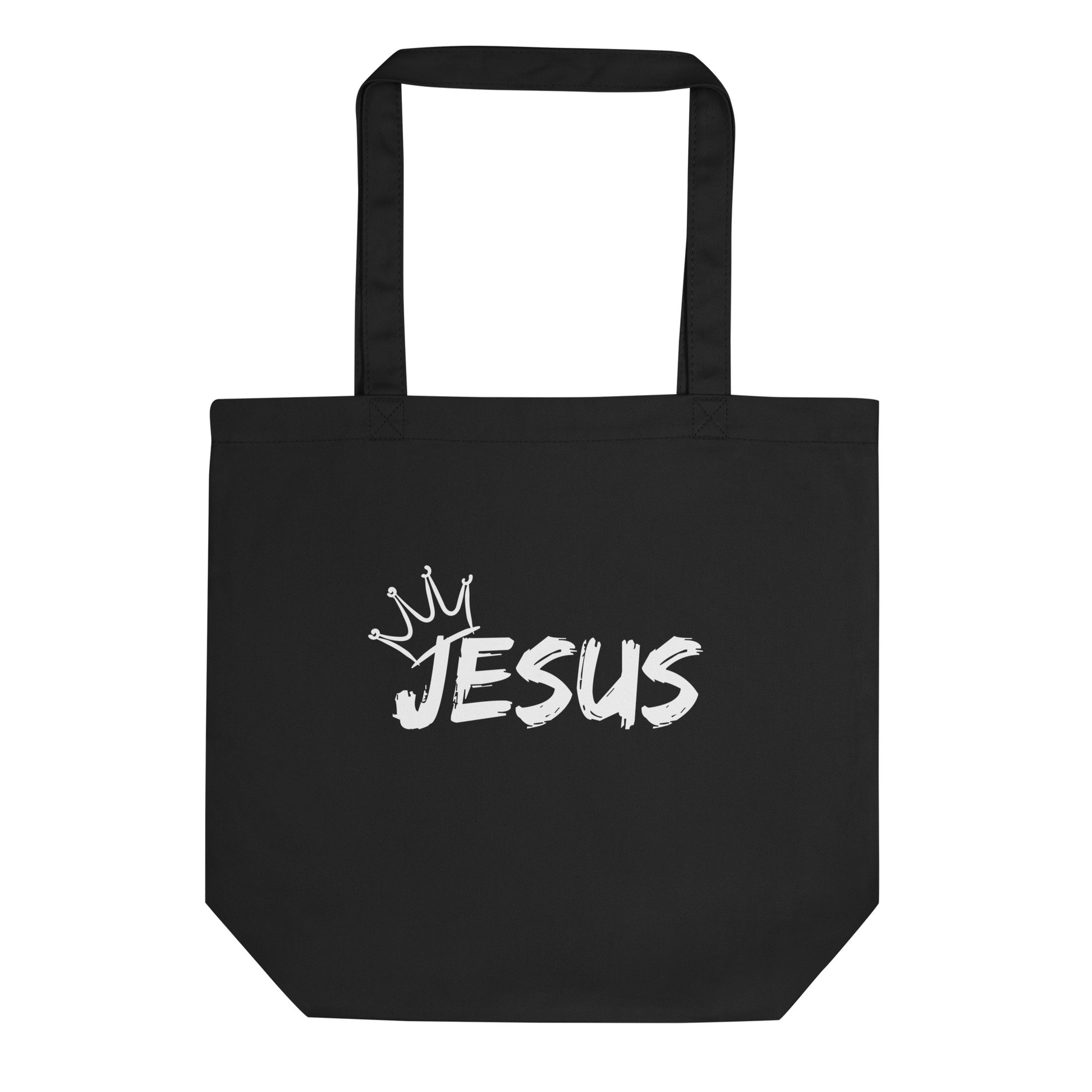 Black cotton tote bag with a white brush-style “JESUS” graphic and a small crown above the lettering.