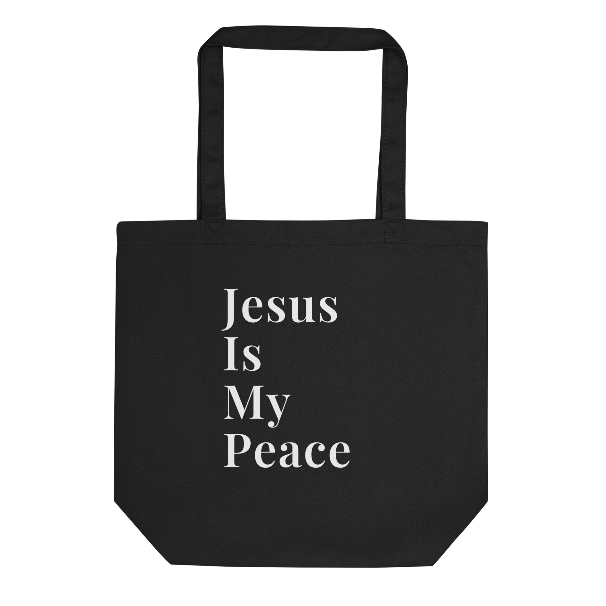 Black cotton tote bag with white stacked text reading “Jesus Is My Peace” on the front.