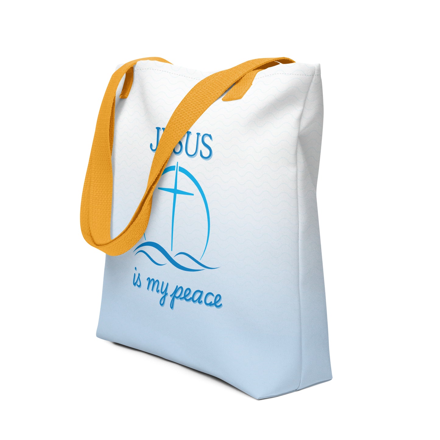 Angled view of the white tote with yellow straps, showing the blue wave background and “JESUS is my peace” cross-and-waves graphic.