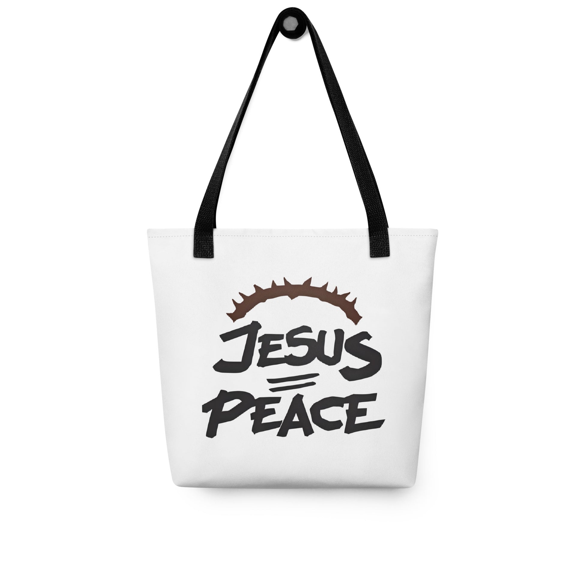White tote bag with black handles hanging on a hook, displaying the “JESUS PEACE” graphic with crown of thorns.