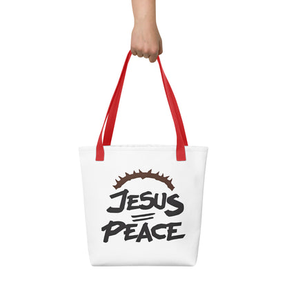 Tote bag carried by hand with red handles, showing the bold “JESUS PEACE” lettering and crown of thorns.