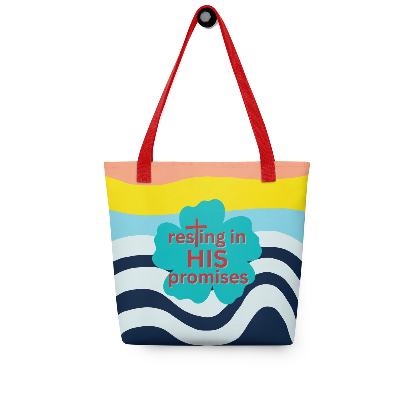 Tote bag hanging on a hook with red handles, wavy navy-and-white pattern, and teal “resting in HIS promises” clover graphic.