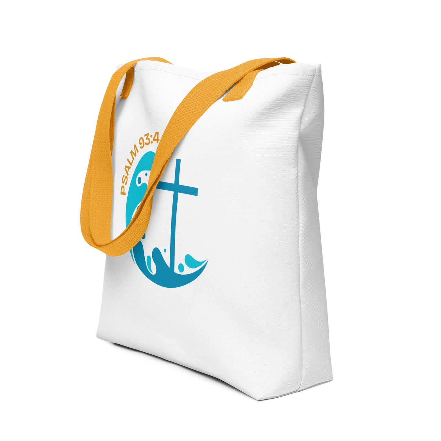 Angled view of a white tote with yellow straps showing “Psalm 93:4” above a blue wave design with a cross.