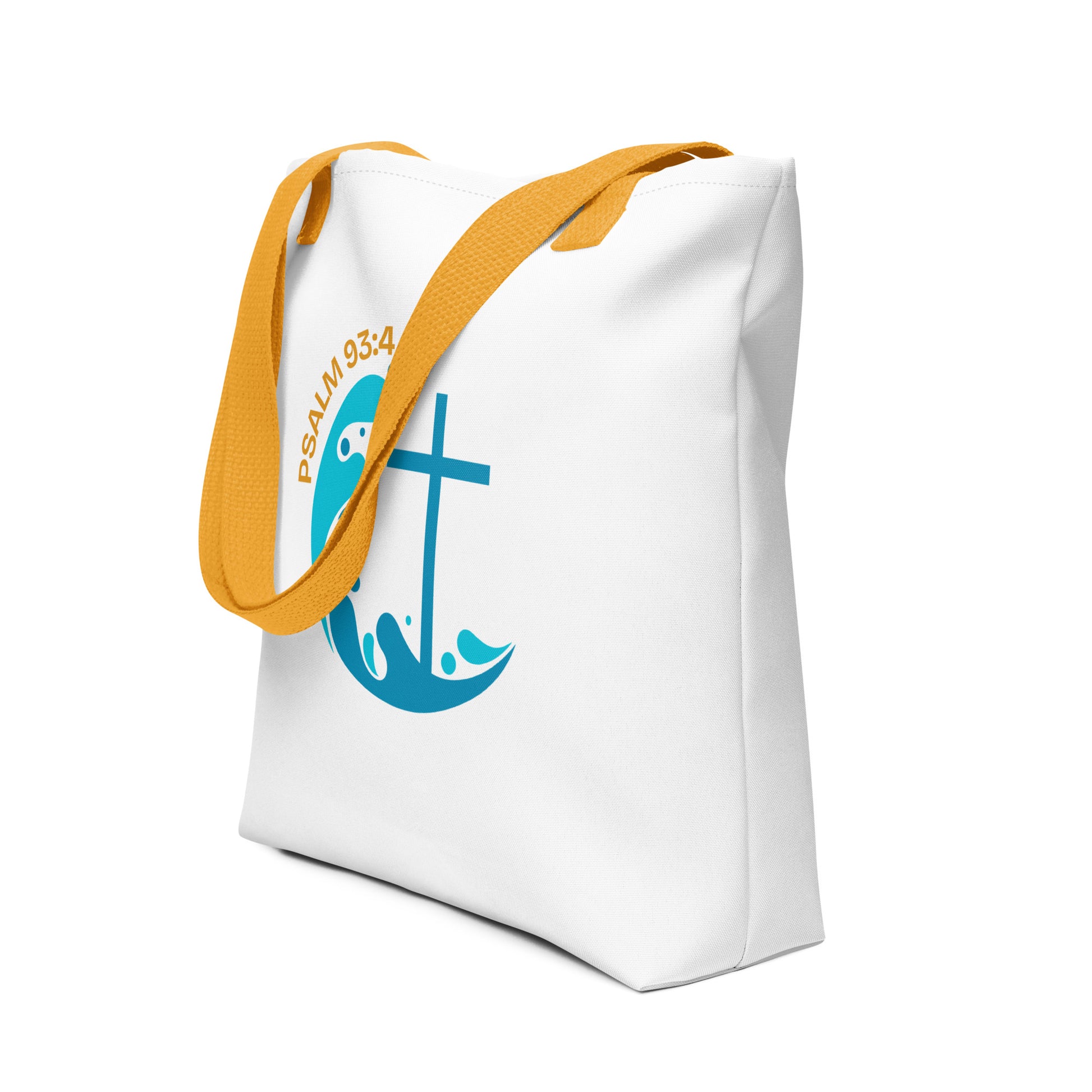 Angled view of a white tote with yellow straps showing “Psalm 93:4” above a blue wave design with a cross.