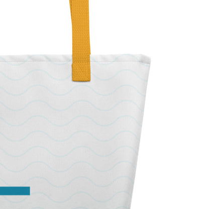 Close-up of mustard yellow woven handle and stitched top edge on the tote bag’s white fabric with subtle wave pattern.