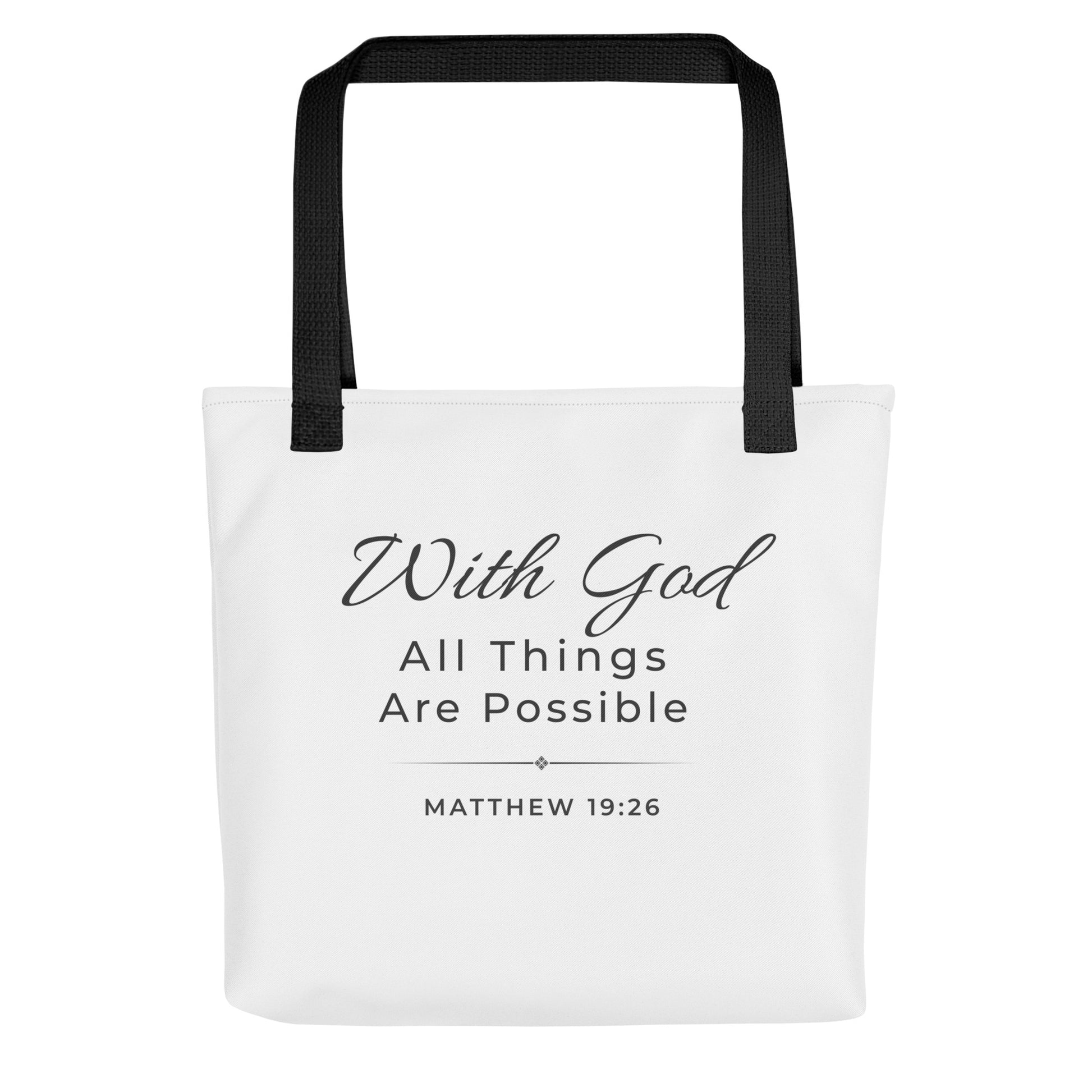 Front view of a white tote bag with black handles featuring “With God all things are possible” and “Matthew 19:26” in dark gray.